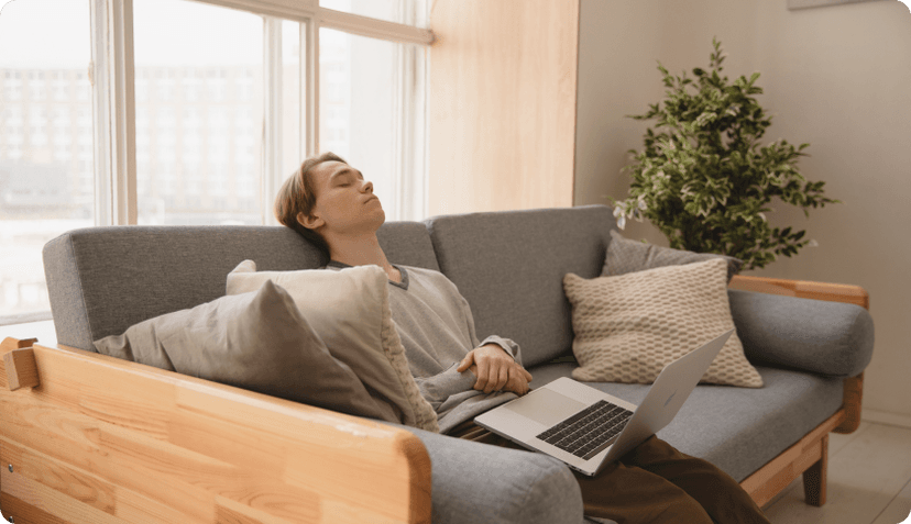 Man having a mental breakdown on his couch
