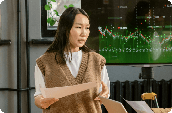 Women with a sheet of paper standing