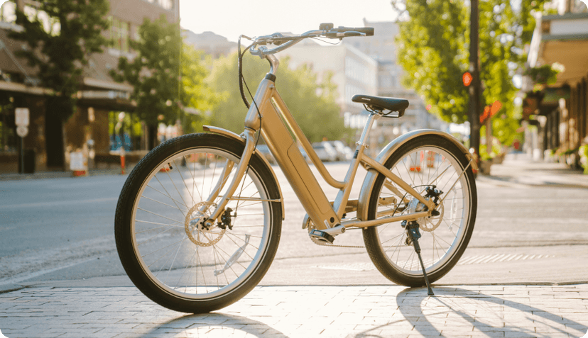 An e-bike parked on a street in a city.