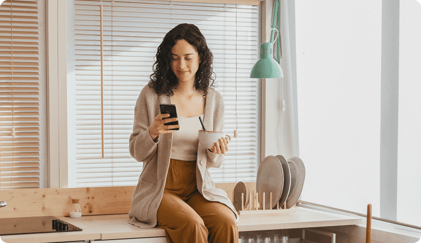 Woman checking her policies on a mobile.
