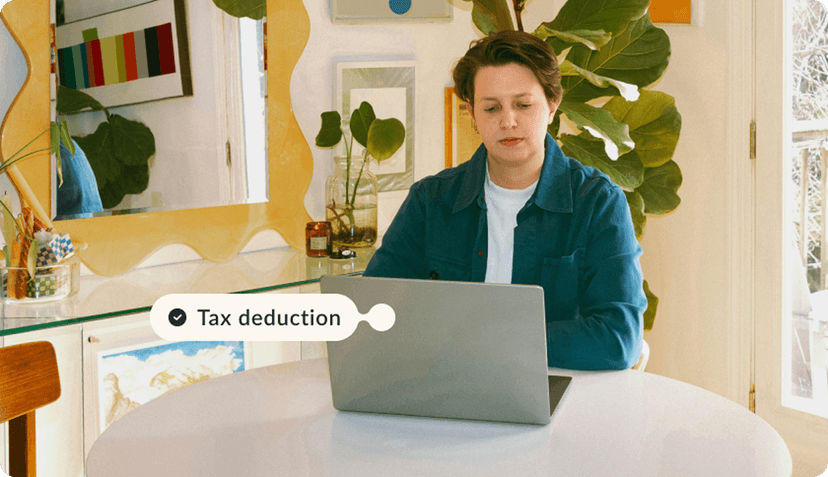 Women with a computer with a tax deduction tag